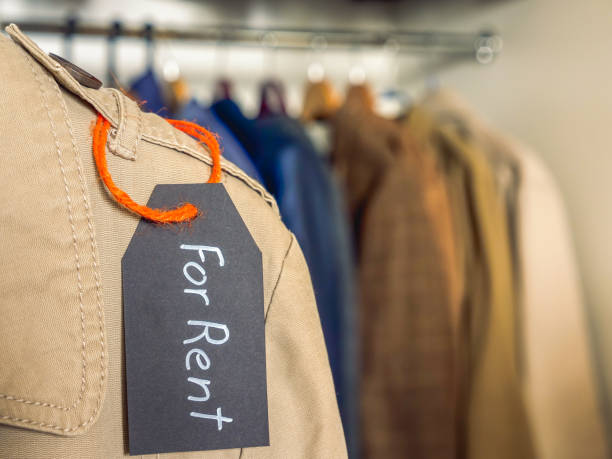 a tag on clothes with an inscription for rent. clothing rental concept.